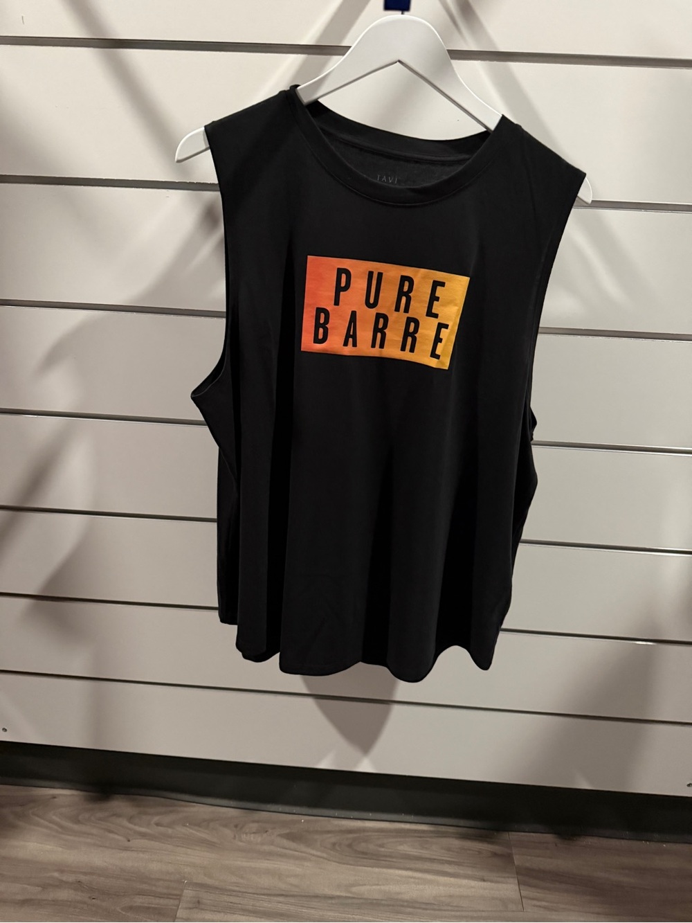 Pure Barre Black Muscle Tank with Gradient Orange Logo